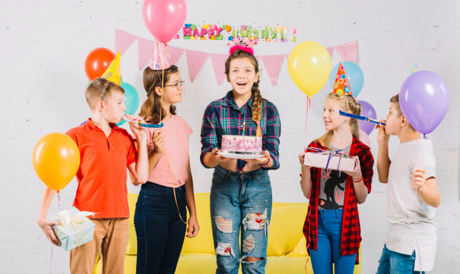 A joyful birthday party scene with children, balloons, and cake, highlighting the fun of an affordable celebration.