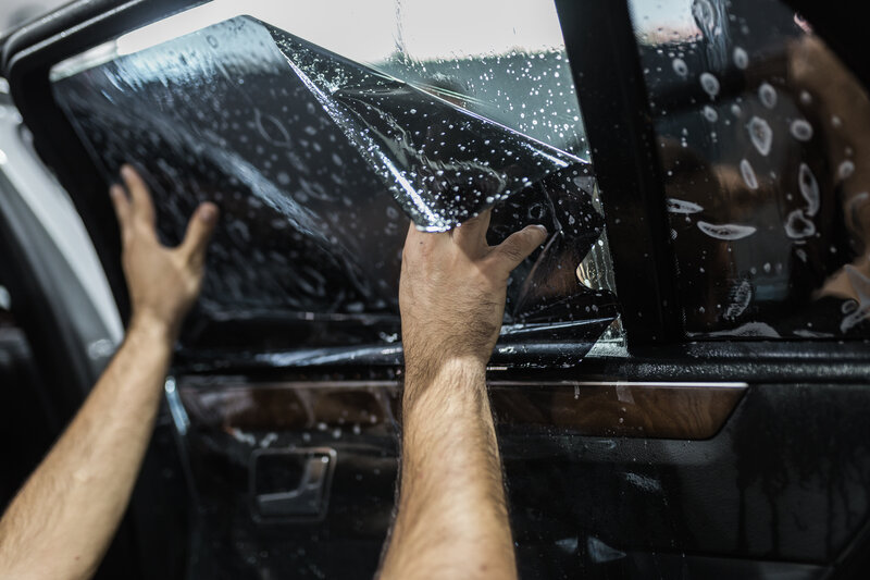 Automotive window tinting