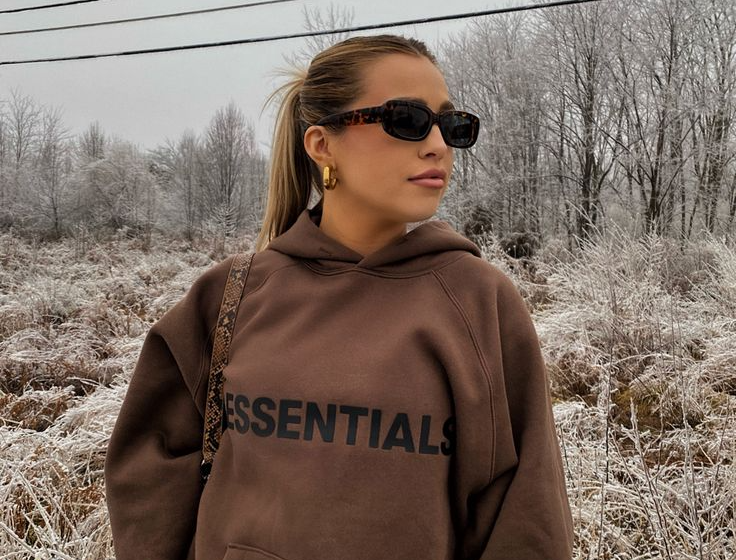 The Brown 1977 Essentials Hoodie Timeless Streetwear Icon